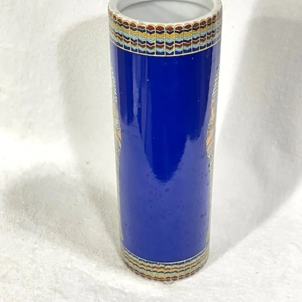 Egyptian ceramic pharaoh King Tut sarcophagus vase.